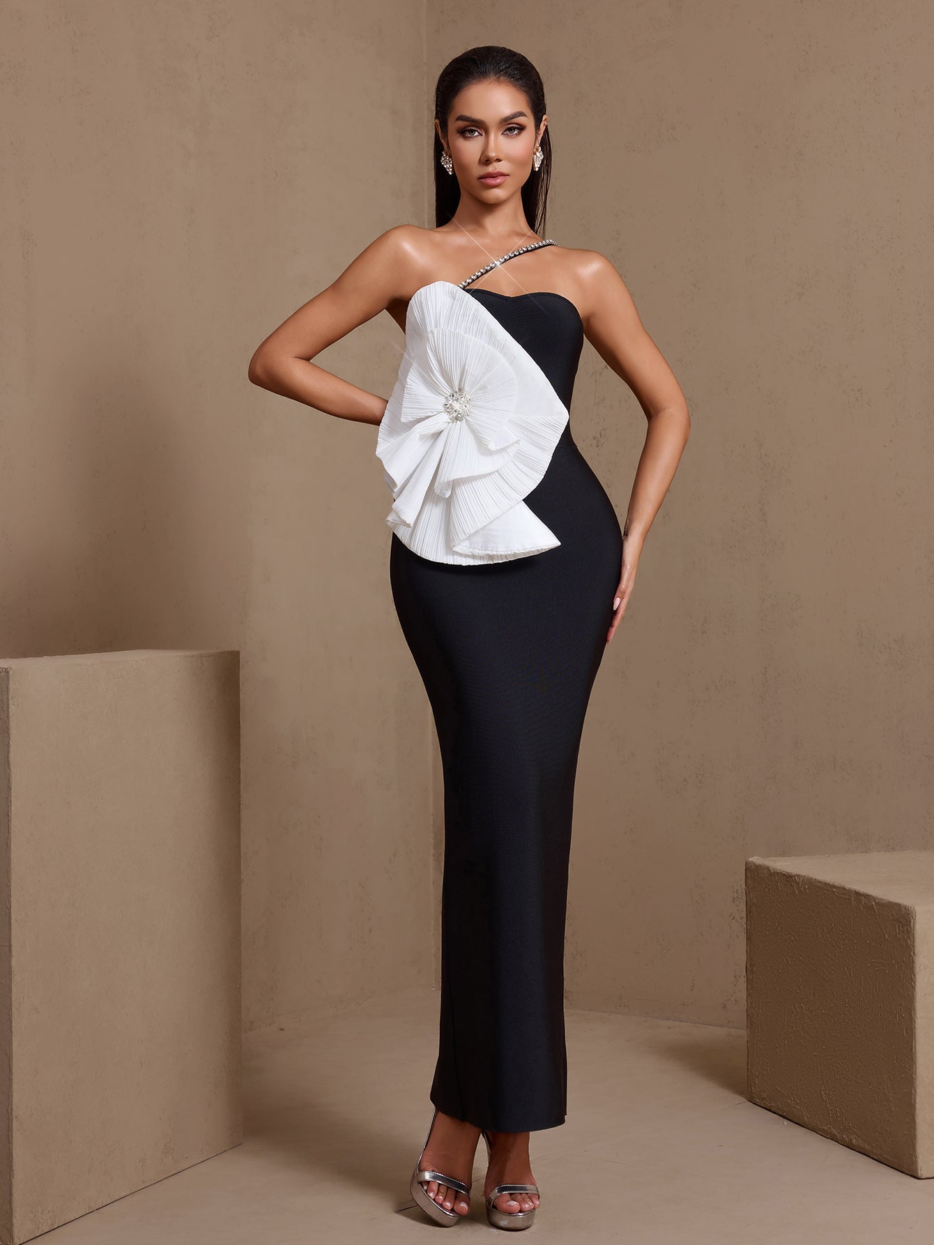 Black asymmetric pleated floral bandage maxi dress, front view