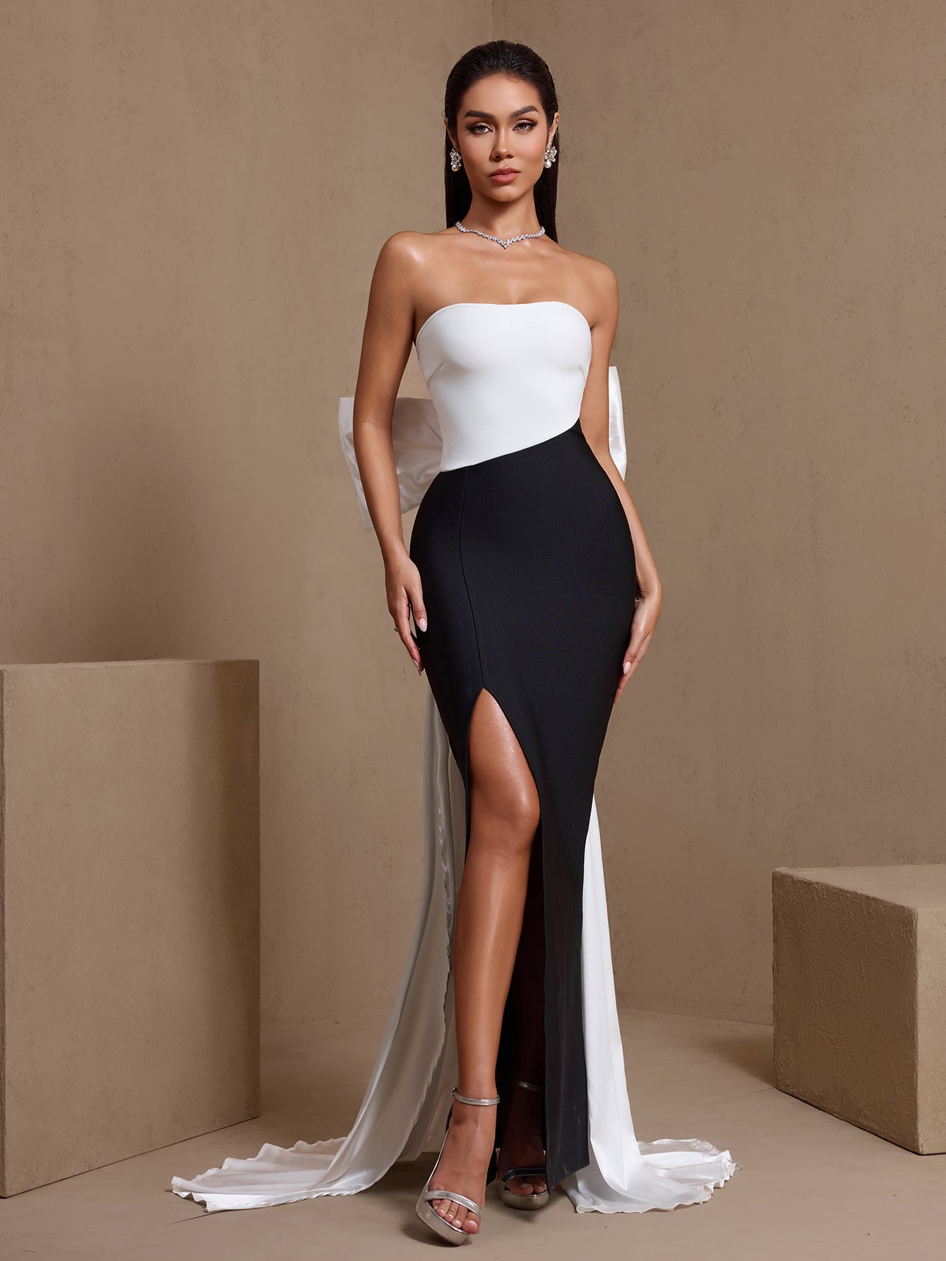 Black and white bow detail strapless bandage maxi dress, full-length front view