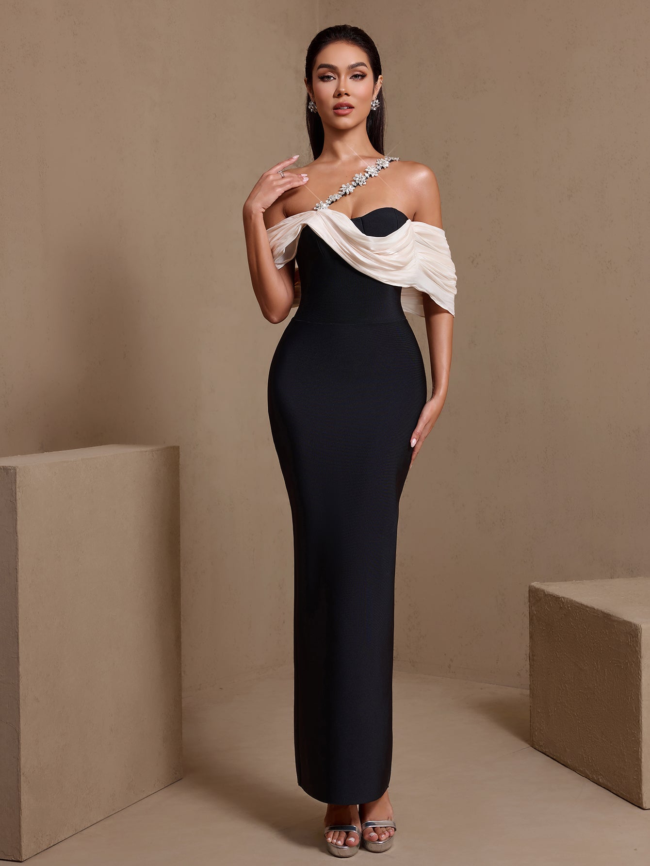 Black crystal-draped asymmetric bandage maxi dress, side view
