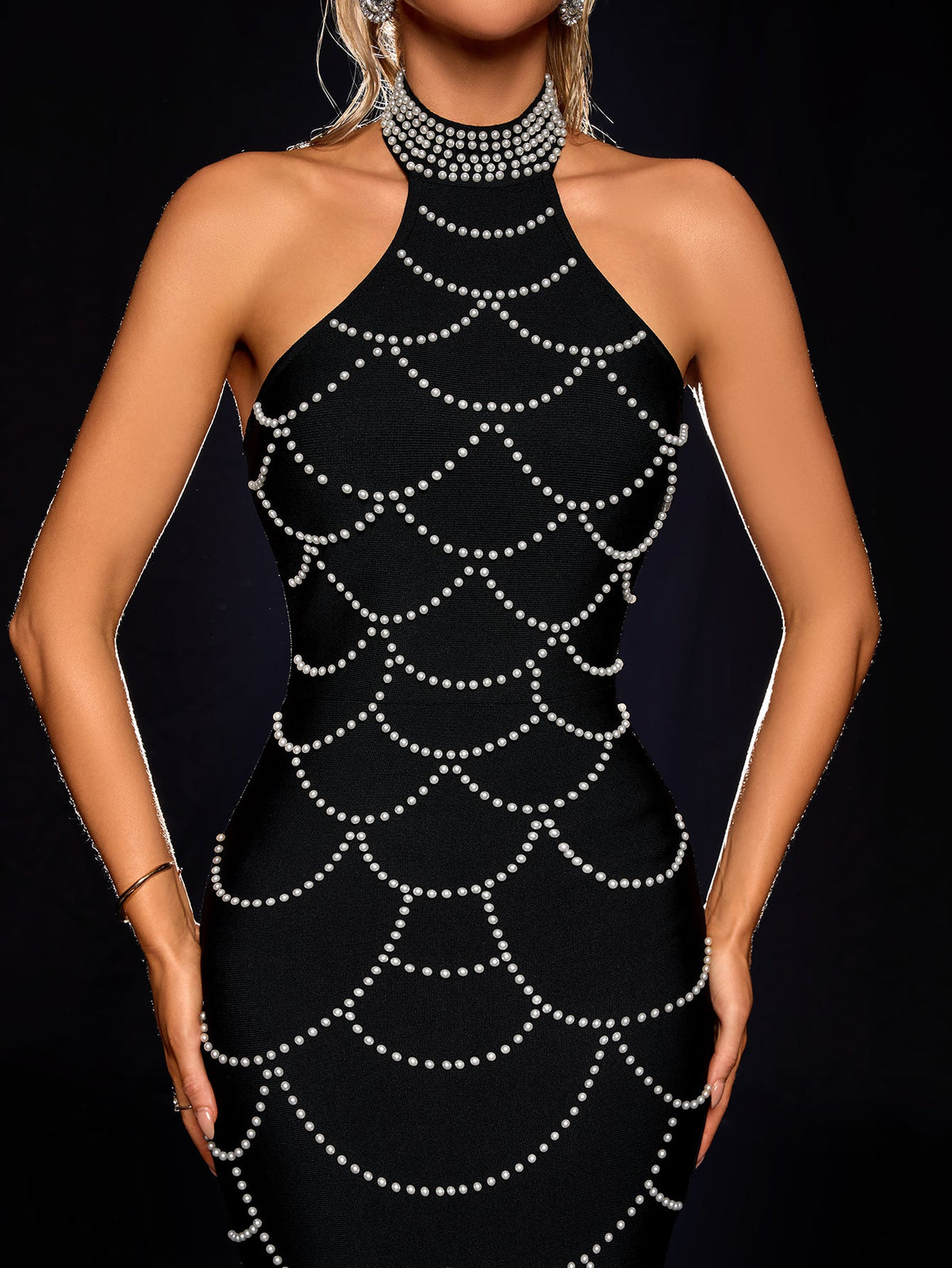 Black halter pearl chain bandage dress, bodice detail