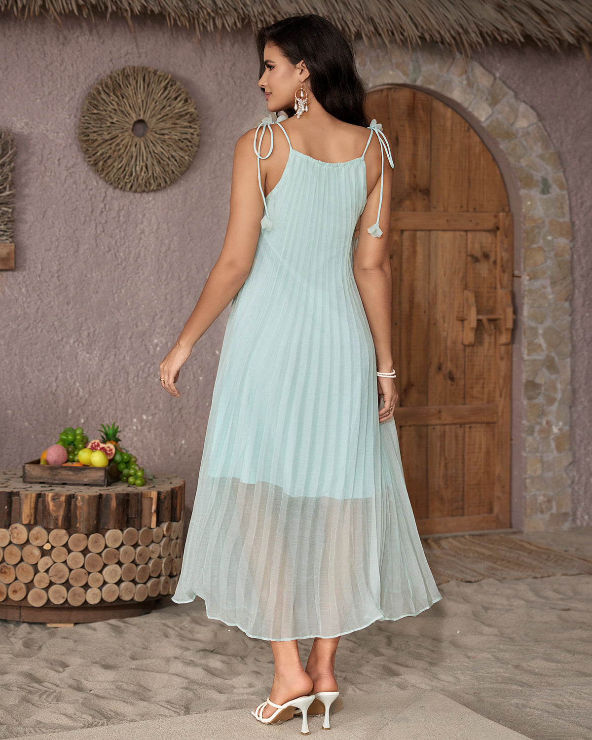 Mint green pleated organza high-slit maxi dress, rear angled view