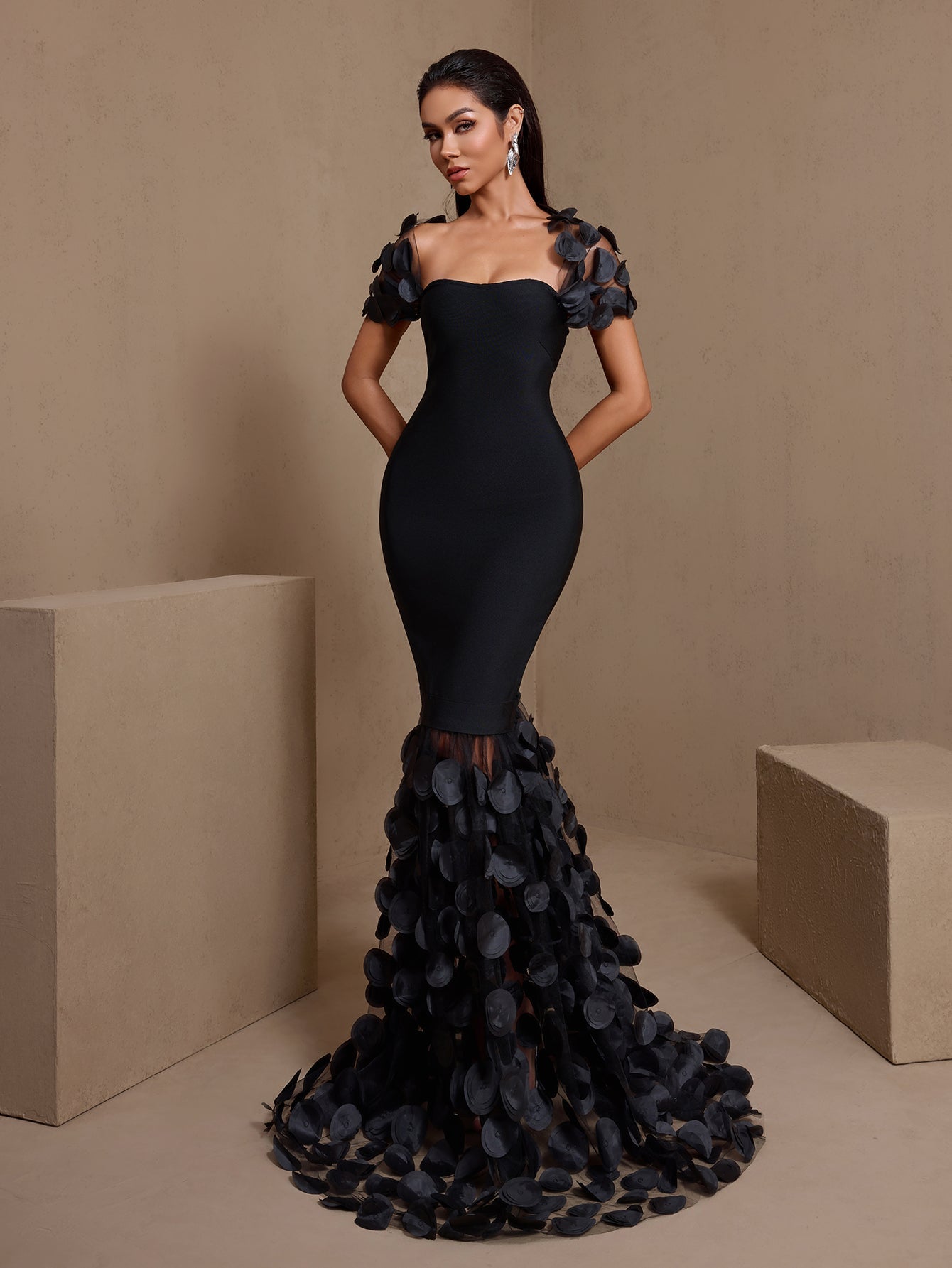 Black bandage maxi dress with a sheer polka dot fishtail skirt