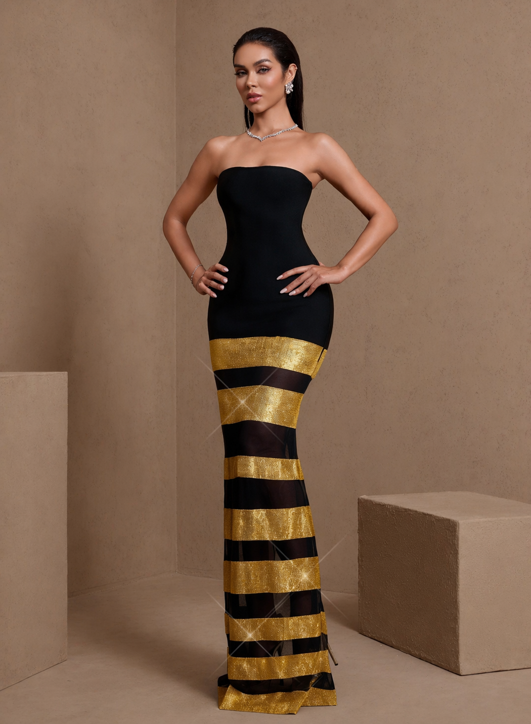 Black and gold sheer stripe strapless bandage maxi dress, front view