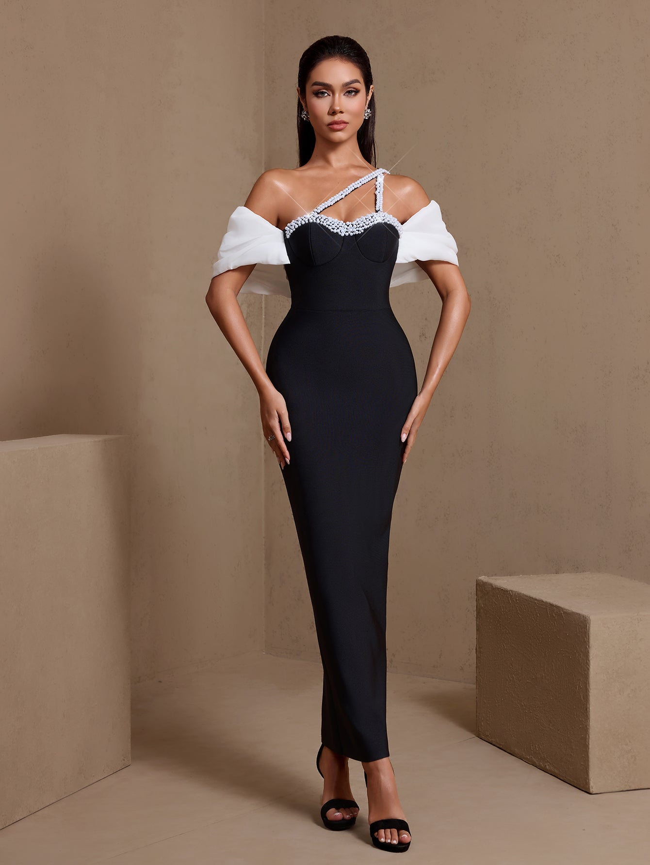 Asymmetric pearl-embellished bandage maxi dress, front view