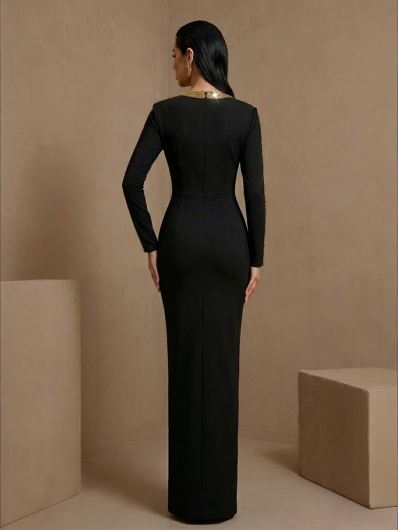 Black crystal chain-trim bandage maxi dress, back view