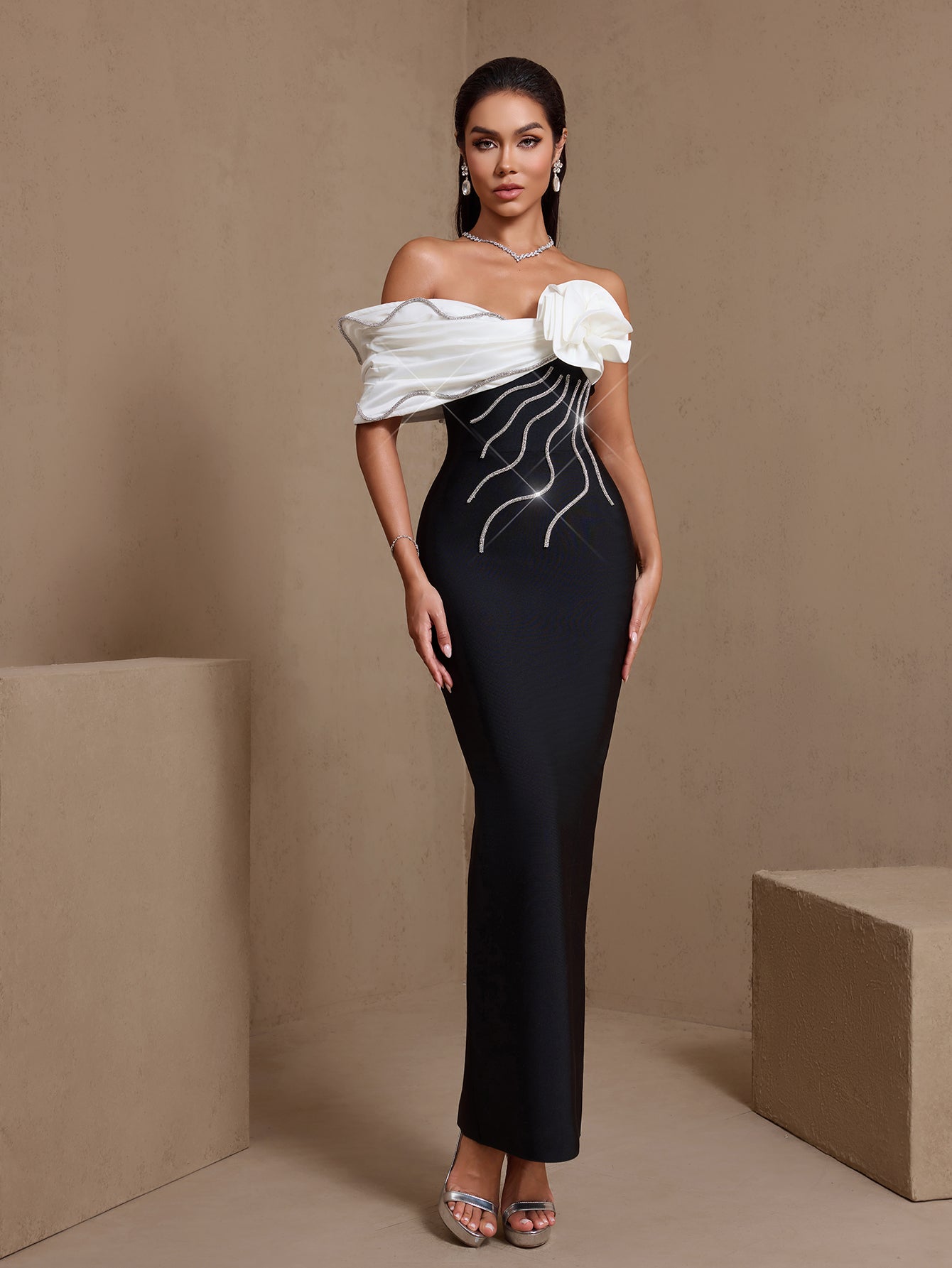 Crystal rosette off-shoulder bandage maxi dress, side view