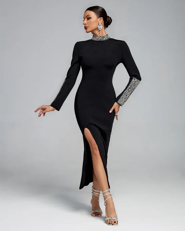 Photo of the Midi Dress Élance by Majestique in black, featuring crystal highneck, front slit, and sculpted silhouette.