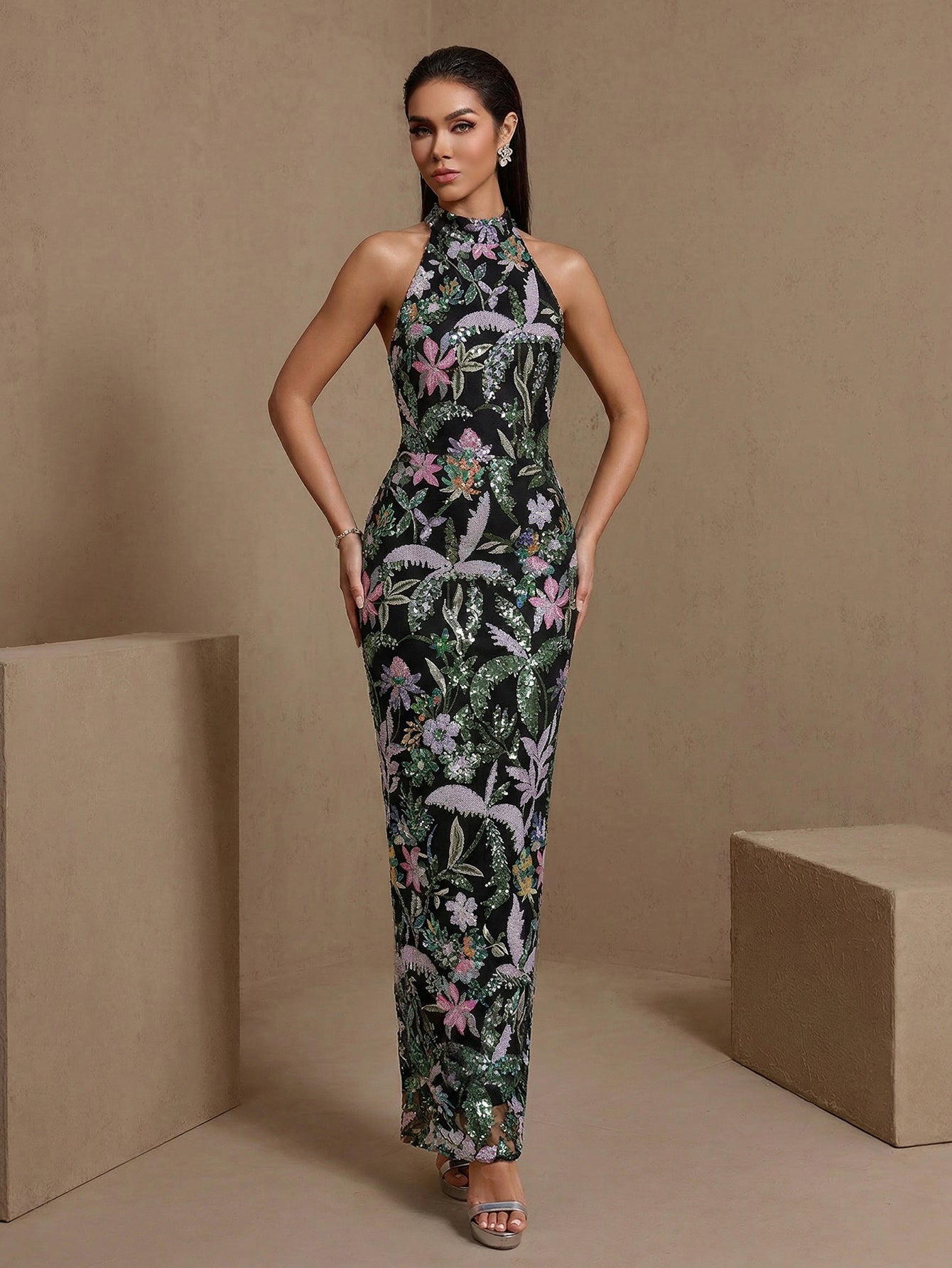 Black floral halter sequin-embroidered maxi dress, angled front view