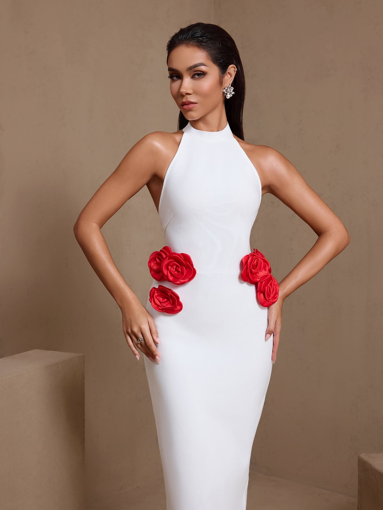 White halter bandage maxi dress, close-up of rose appliqués