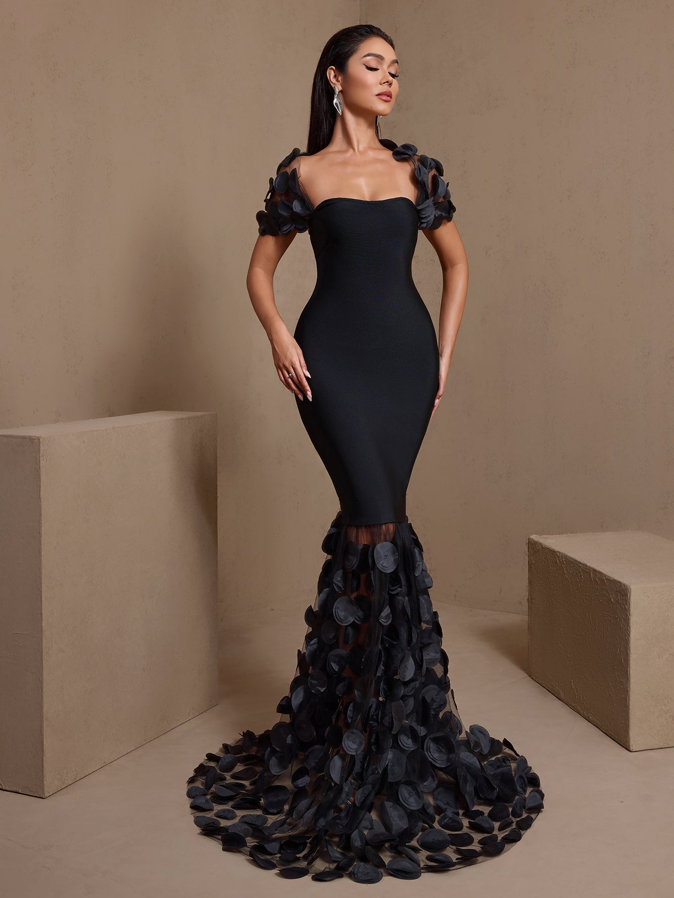 Black bandage maxi dress with sheer polka dot mermaid hem