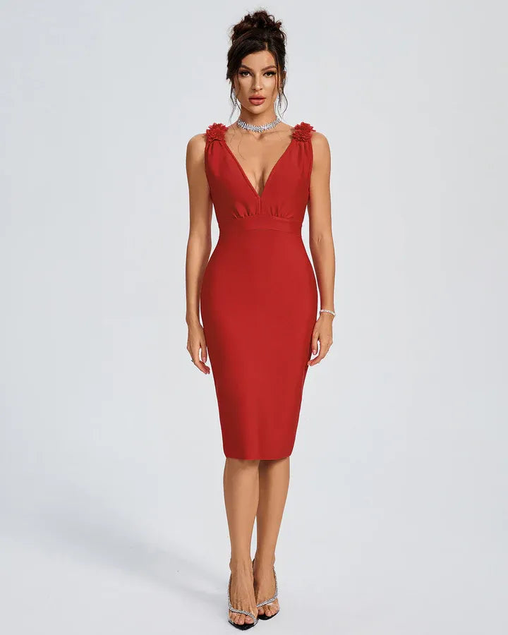 Photo of the Midi Dress Rosette by Majestique in red, featuring floral shoulders, deep V neckline, and sculpted midi silhouette.