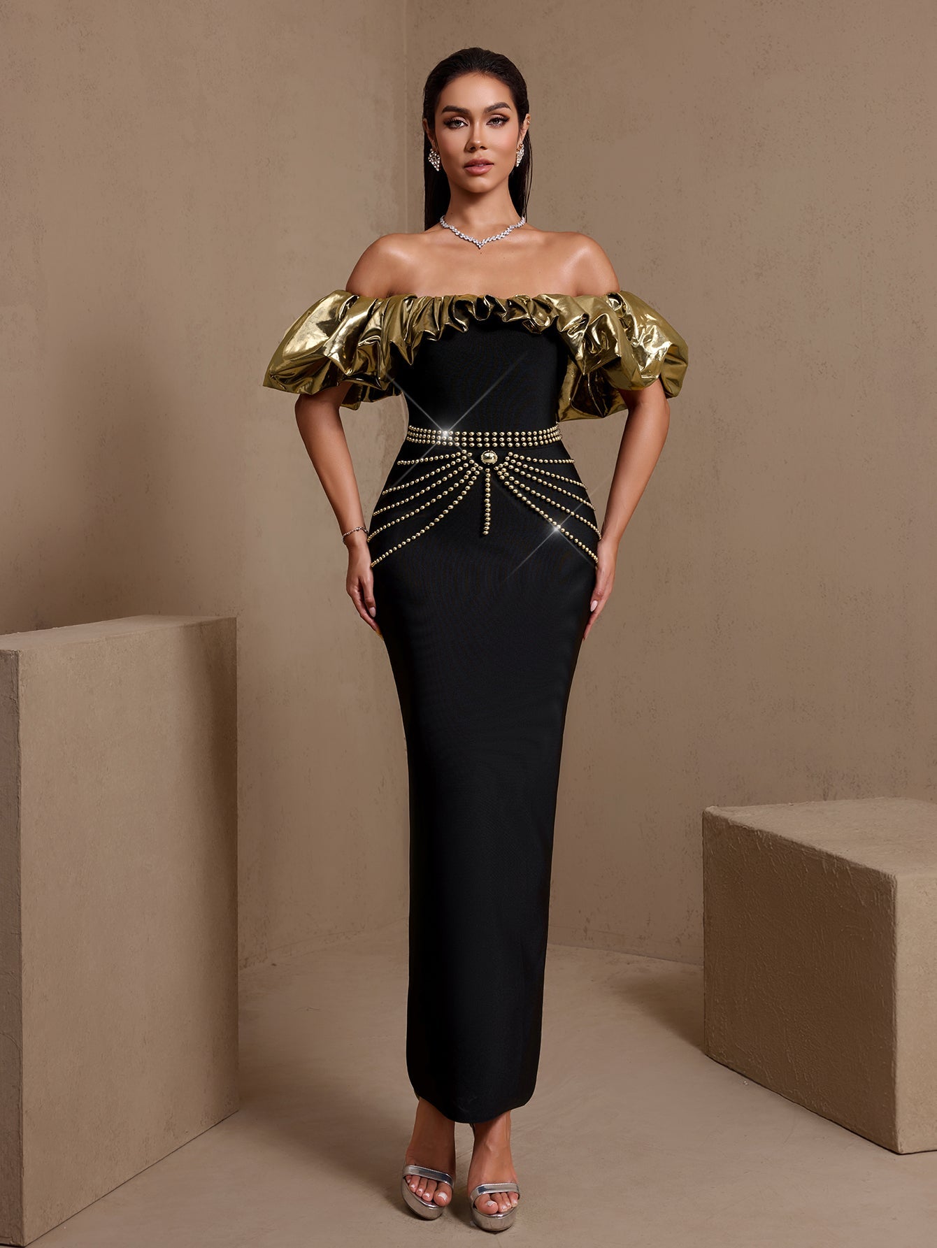 Black ruffled crystal off-shoulder bandage maxi dress, front view